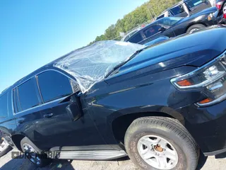 2015 Chevrolet Tahoe Commercial with VIN 1GNLC2EC3FR280365, listed as a IAAI auction lot 40580594 with 195,740 mi miles and . Bid and sale history available at DreamBid. Image 13.