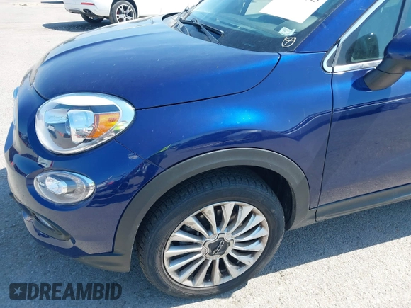 2016 FIAT 500X Lounge z VIN ZFBCFYDT3GP360656, wystawiony jako IAAI lot #39720445 z przebiegiem 52 736 mil mil oraz . Historia ofert i sprzedaży dostępna na DreamBid. Obrazek 13.