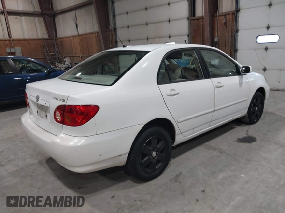 2003 Toyota Corolla CE with VIN JTDBR32E330020921, listed as a IAAI auction lot 41987206 with 131,648 mi miles and . Bid and sale history available at DreamBid. Image 4.