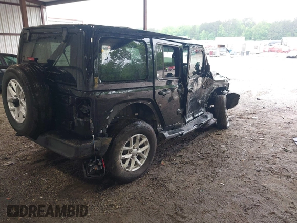 2023 Jeep Wrangler Willys with VIN 1C4HJXDG0PW617101, listed as a IAAI auction lot 42111687 with 56,415 mi miles and . Bid and sale history available at DreamBid. Image 4.