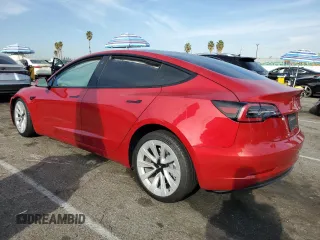 2023 Tesla Model 3 with VIN 5YJ3E1EA5PF548786, listed as a Copart auction lot 82928324 with Not Provided miles and Salvage Title. Bid and sale history available at DreamBid. Image 2.