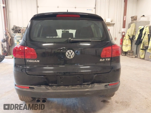 2014 Volkswagen Tiguan SE z VIN WVGAV3AX9EW614094, wystawiony jako IAAI lot #42350601 z przebiegiem 128 996 mil mil oraz . Historia ofert i sprzedaży dostępna na DreamBid. Obrazek 17.