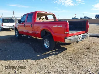 1999 Ford Super Duty F-250 XL with VIN 1FTNW21F7XEA71082, listed as a IAAI auction lot 41665200 with 210,841 mi miles. Bid and sale history available at carsss.com. Image 3.
