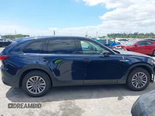 2025 Mazda CX-90 Preferred z VIN JM3KKBHD7S1200318, wystawiony jako IAAI lot #42045306 z przebiegiem 4 886 mil mil oraz . Historia ofert i sprzedaży dostępna na DreamBid. Obrazek 14.