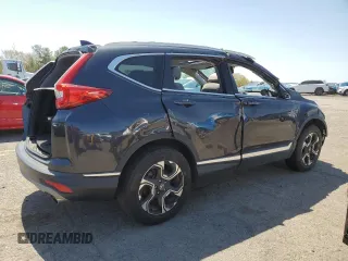 2018 Honda CR-V Touring with VIN 2HKRW2H95JH685749, listed as a Copart auction lot 53828605 with Not Provided miles and Salvage Title. Bid and sale history available at carsss.com. Image 3.