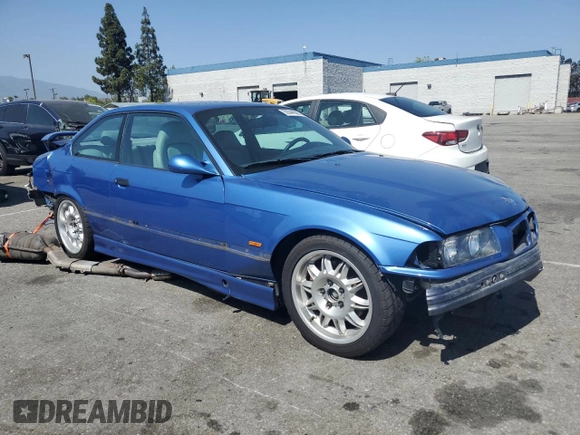 1998 BMW 3 Series M3 with VIN WBSBG9324WEY78850, listed as a Copart auction lot 59344585 with 117,490 mi miles and Salvage title. Bid and sale history available at DreamBid. Image 4.