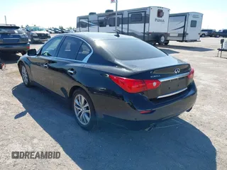 2014 Infiniti Q50 Premium z VIN JN1BV7AP2EM672661, wystawiony jako IAAI lot #42319325 z przebiegiem 85 803 mil mil oraz . Historia ofert i sprzedaży dostępna na DreamBid. Obrazek 3.