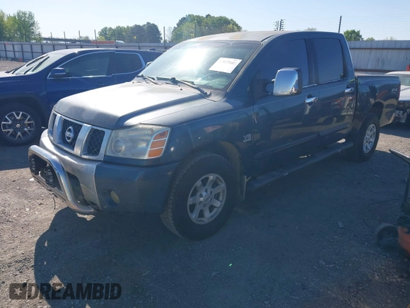 2004 Nissan Titan LE with VIN 1N6AA07B74N547779, listed as a IAAI auction lot 41977881 with 157,348 mi miles and . Bid and sale history available at carsss.com. Image 2.