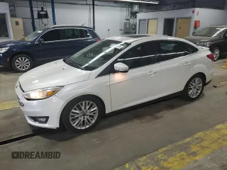 2017 Ford Focus Titanium with VIN 1FADP3J25HL213184, listed as a Copart auction lot 61653155 with 120,883 mi miles and Clean title. Bid and sale history available at DreamBid. Image 1.