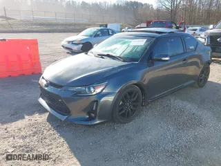 2014 Scion tC with VIN JTKJF5C74E3083312, listed as a IAAI auction lot 41730086 with 118,124 mi miles. Bid and sale history available at carsss.com. Image 17.
