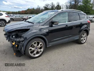 2016 Ford Escape Titanium with VIN 1FMCU9J93GUB78356, listed as a Copart auction lot 64264715 with 95,775 mi miles and Salvage title. Bid and sale history available at DreamBid. Image 1.