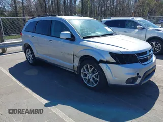 2014 Dodge Journey SXT z VIN 3C4PDCBG7ET227470, wystawiony jako IAAI lot #41843128 z przebiegiem 98 195 mil mil oraz . Historia ofert i sprzedaży dostępna na DreamBid. Obrazek 1.