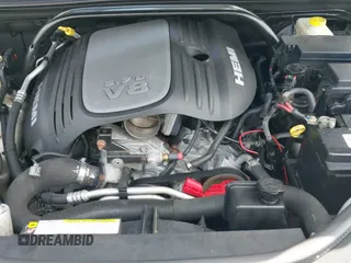 2009 Jeep Grand Cherokee with VIN 1J8HR68T09C523470, listed as a IAAI auction lot 42764630 with 131,376 mi miles and . Bid and sale history available at DreamBid. Image 13.