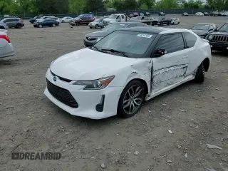 2014 Scion tC z VIN JTKJF5C70E3084411, wystawiony jako Copart lot #54255385 z przebiegiem 152 715 mil mil oraz Szkoda całkowita • Salvage title. Historia ofert i sprzedaży dostępna na DreamBid. Obrazek 14.