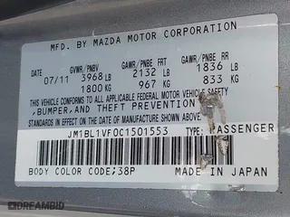 2012 Mazda Mazda3 i Touring with VIN JM1BL1VF0C1501553, listed as a IAAI auction lot 41910690 with 139,879 mi miles. Bid and sale history available at carsss.com. Image 9.