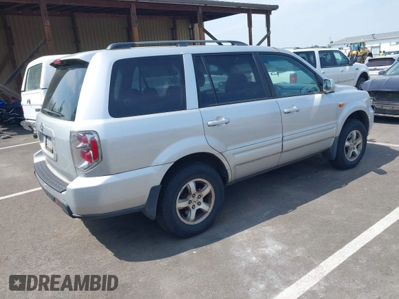 2006 Honda Pilot EX with VIN 2HKYF18446H000383, listed as a IAAI auction lot 42129875 with 206,723 mi miles and . Bid and sale history available at DreamBid. Image 4.