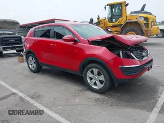2013 Kia Sportage LX with VIN KNDPB3A24D7485007, listed as a IAAI auction lot 42446887 with 106,033 mi miles and . Bid and sale history available at DreamBid. Image 1.
