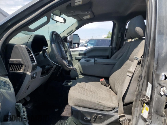 2016 Ford F-150 XLT with VIN 1FTFW1EFXGKF69299, listed as a Copart auction lot 60369425 with 125,205 mi miles and Salvage title. Bid and sale history available at DreamBid. Image 7.