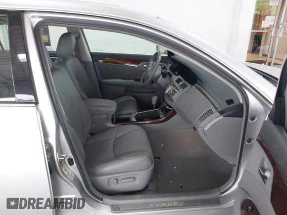 2009 Toyota Avalon XL with VIN 4T1BK36B69U341854, listed as a IAAI auction lot 41727553 with 102,369 mi miles. Bid and sale history available at carsss.com. Image 5.