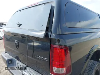 2015 Ram 2500 Laramie with VIN 3C6UR5FL0FG655552, listed as a IAAI auction lot 42456897 with 143,885 mi miles and . Bid and sale history available at DreamBid. Image 14.
