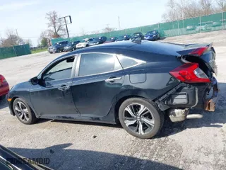 2016 Honda Civic Sedan Touring with VIN 19XFC1F9XGE043422, listed as a IAAI auction lot 41930030 with 141,027 mi miles. Bid and sale history available at carsss.com. Image 14.