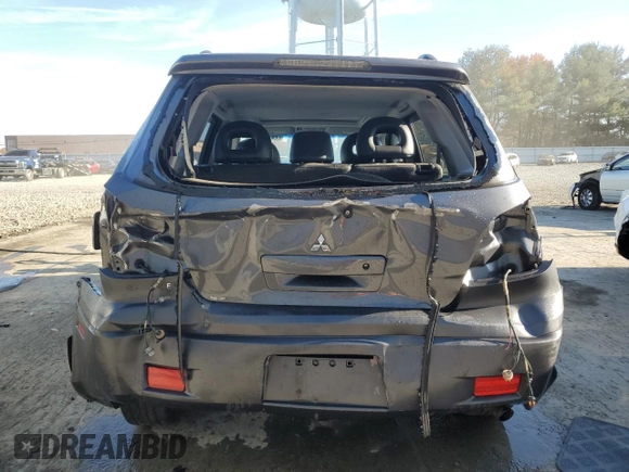 2006 Mitsubishi Outlander z VIN JA4LZ81F96U025401, wystawiony jako Copart lot #78197014 z przebiegiem Nie podano mil oraz Szkoda całkowita • Salvage title. Historia ofert i sprzedaży dostępna na DreamBid. Obrazek 6.