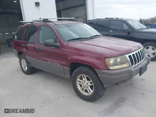 2003 Jeep Grand Cherokee Laredo with VIN 1J4GW48S83C563627, listed as a IAAI auction lot 41910225 with 150,264 mi miles. Bid and sale history available at carsss.com. Image 1.