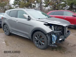 2018 Hyundai Santa Fe Ultimate z VIN 5NMZW4LA7JH102625, wystawiony jako IAAI lot #41531813 z przebiegiem 65 533 mil mil oraz . Historia ofert i sprzedaży dostępna na DreamBid. Obrazek 1.
