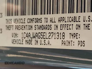2014 Jeep Wrangler Sport with VIN 1C4AJWAG5EL271318, listed as a IAAI auction lot 41780040 with 128,942 mi miles and . Bid and sale history available at DreamBid. Image 9.
