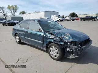 1998 Honda Civic EX with VIN JHMEJ8644WS000994, listed as a Copart auction lot 48209805 with 226,561 mi miles and Salvage Title. Bid and sale history available at carsss.com. Image 4.