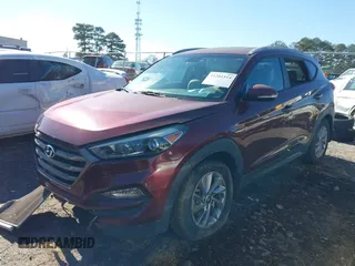 2016 Hyundai Tucson Sport with VIN KM8J33A22GU194476, listed as a IAAI auction lot 41201514 with 41,601 mi miles. Bid and sale history available at carsss.com. Image 2.