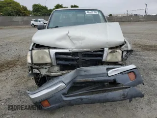 2000 Toyota Tacoma with VIN 4TAVN52N6YZ664111, listed as a Copart auction lot 60163195 with 315,732 mi miles and Salvage title. Bid and sale history available at DreamBid. Image 5.