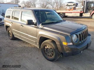 2015 Jeep Patriot Sport with VIN 1C4NJPBA0FD240510, listed as a IAAI auction lot 41150667 with 114,923 mi miles. Bid and sale history available at carsss.com. Image 1.