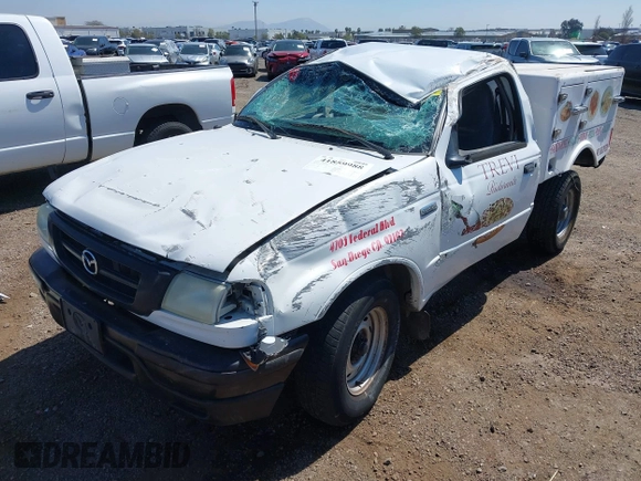 2002 Mazda B-Series Truck SX with VIN 4F4YR12D42TM16317, listed as a IAAI auction lot 41859988 with 220,933 mi miles and . Bid and sale history available at DreamBid. Image 6.