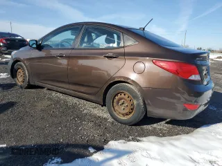 2015 Hyundai Accent GLS with VIN KMHCT4AE8FU815937, listed as a Copart auction lot 52503685 with 136,253 mi miles and Clean Title. Bid and sale history available at carsss.com. Image 2.