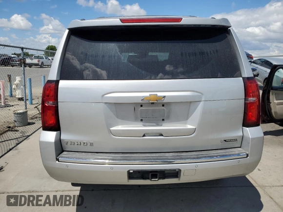 2017 Chevrolet Tahoe Premier with VIN 1GNSCCKC5HR212660, listed as a Copart auction lot 56337065 with 135,989 mi miles and Salvage title. Bid and sale history available at DreamBid. Image 6.