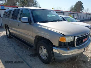 2003 GMC Yukon XL SLT z VIN 1GKEC16Z13J145379, wystawiony jako IAAI lot #41737976 z przebiegiem 157 943 mil mil oraz . Historia ofert i sprzedaży dostępna na DreamBid. Obrazek 1.