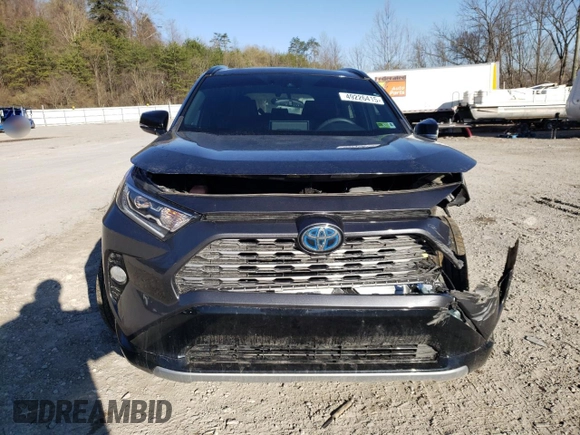 2021 Toyota RAV4 Hybrid XSE with VIN 2T3E6RFV8MW027802, listed as a Copart auction lot 49226415 with Not provided miles and Salvage title. Bid and sale history available at DreamBid. Image 5.