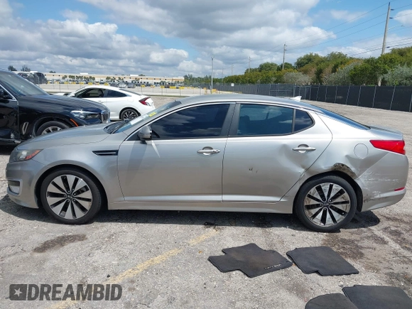 2012 Kia Optima SX with VIN 5XXGR4A67CG066935, listed as a IAAI auction lot 41989589 with 80,420 mi miles and . Bid and sale history available at carsss.com. Image 14.
