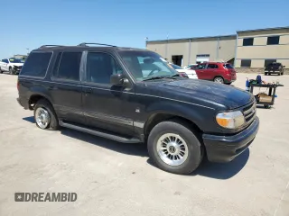 1997 Ford Explorer XLT with VIN 1FMDU35P5VZB51640, listed as a Copart auction lot 52030474 with 214,647 mi miles and Clean title. Bid and sale history available at DreamBid. Image 4.