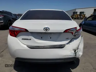 2014 Toyota Corolla L with VIN 5YFBURHE8EP069548, listed as a Copart auction lot 61000225 with 119,711 mi miles and Salvage title. Bid and sale history available at DreamBid. Image 6.