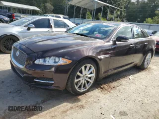 2013 Jaguar XJ with VIN SAJWA1C75D8V54004, listed as a Copart auction lot 76922464 with 107,175 mi miles and Salvage Title. Bid and sale history available at DreamBid. Image 1.