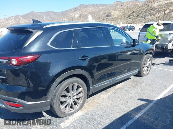 2017 Mazda CX-9 Grand Touring with VIN JM3TCBDY0H0130671, listed as a IAAI auction lot 42514237 with 81,016 mi miles and . Bid and sale history available at DreamBid. Image 13.