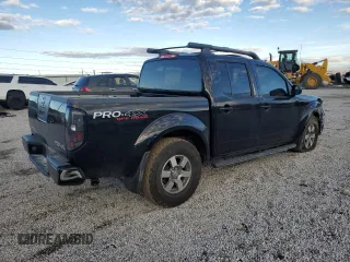 2011 Nissan Frontier Pro-4X with VIN 1N6AD0EV8BC427339, listed as a Copart auction lot 88293455 with 99,856 mi miles and Salvage title. Bid and sale history available at DreamBid. Image 3.
