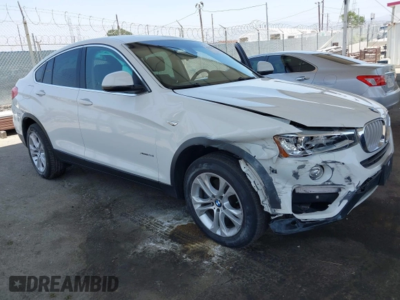 2015 BMW X4 xDrive28i with VIN 5UXXW3C5XF0M89259, listed as a IAAI auction lot 42553903 with 98,960 mi miles and . Bid and sale history available at DreamBid. Image 1.