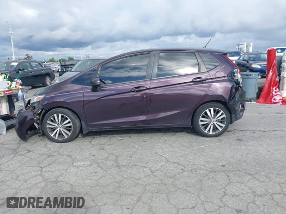 2015 Honda Fit EX-L with VIN 3HGGK5H89FM758572, listed as a IAAI auction lot 41784414 with 97,707 mi miles. Bid and sale history available at carsss.com. Image 14.