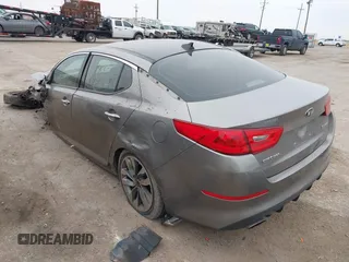 2014 Kia Optima SXL Turbo with VIN 5XXGR4A67EG336118, listed as a IAAI auction lot 41613725 with 121,671 mi miles and . Bid and sale history available at DreamBid. Image 3.