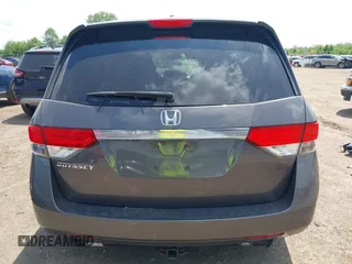 2014 Honda Odyssey EX-L z VIN 5FNRL5H64EB089875, wystawiony jako IAAI lot #42279431 z przebiegiem 107 716 mil mil oraz . Historia ofert i sprzedaży dostępna na DreamBid. Obrazek 17.