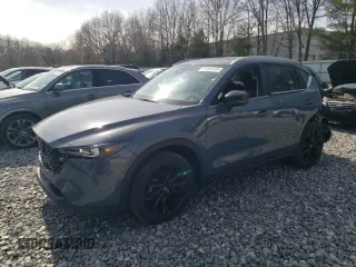 2023 Mazda CX-5 S Carbon Edition z VIN JM3KFBCM1P0106556, wystawiony jako Copart lot #51444195 z przebiegiem 25 894 mil mil oraz Szkody całkowita. Historia ofert i sprzedaży dostępna na DreamBid. Obrazek 1.