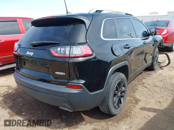 2021 Jeep Cherokee Latitude Lux with VIN 1C4PJLMX4MD107152, listed as a IAAI auction lot 41857619 with 51,686 mi miles. Bid and sale history available at carsss.com. Image 4.